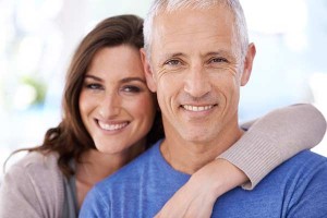 Smiling Couple After Bone Grafting